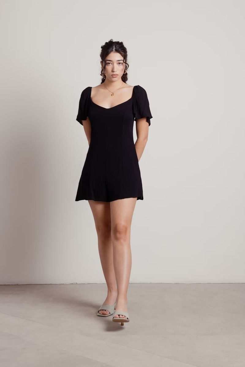 black-every-now-and-then-flowy-romper-1.jpg