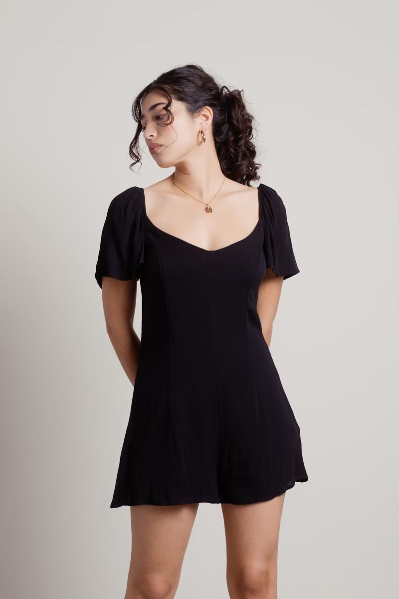 black-every-now-and-then-flowy-romper.jpg