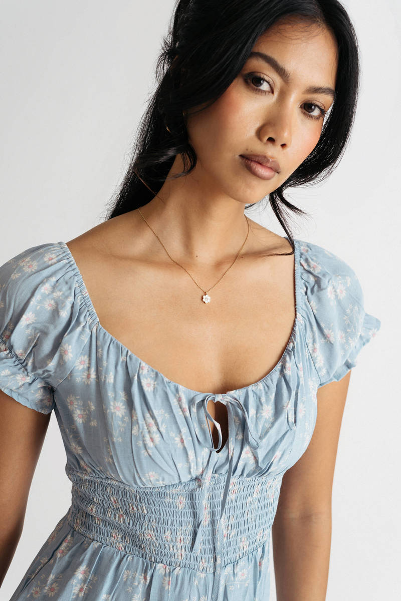 blue-daphenie-floral-smocked-romper-1.jpg